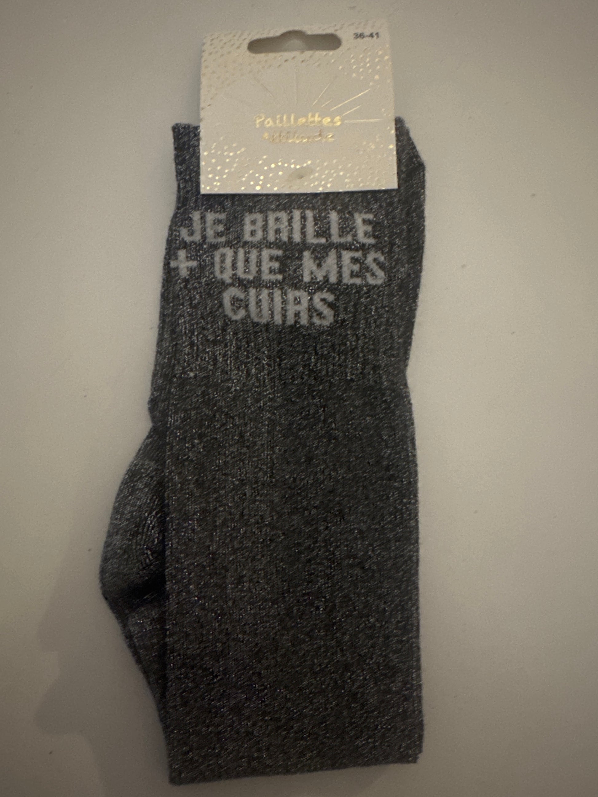 Chaussettes pailletées « Je brille + que mes cuirs »