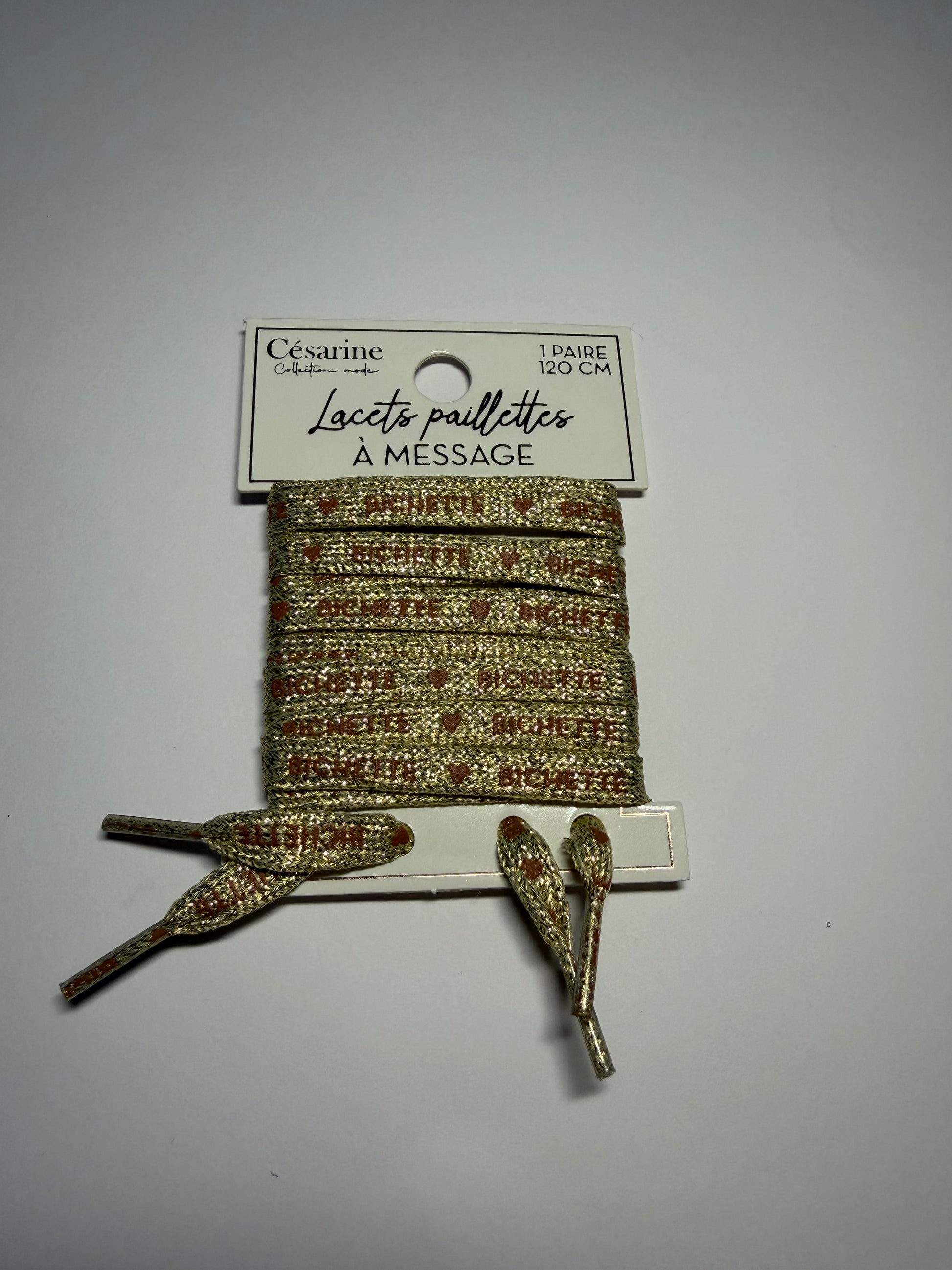 Lacets avec inscriptions pailletées