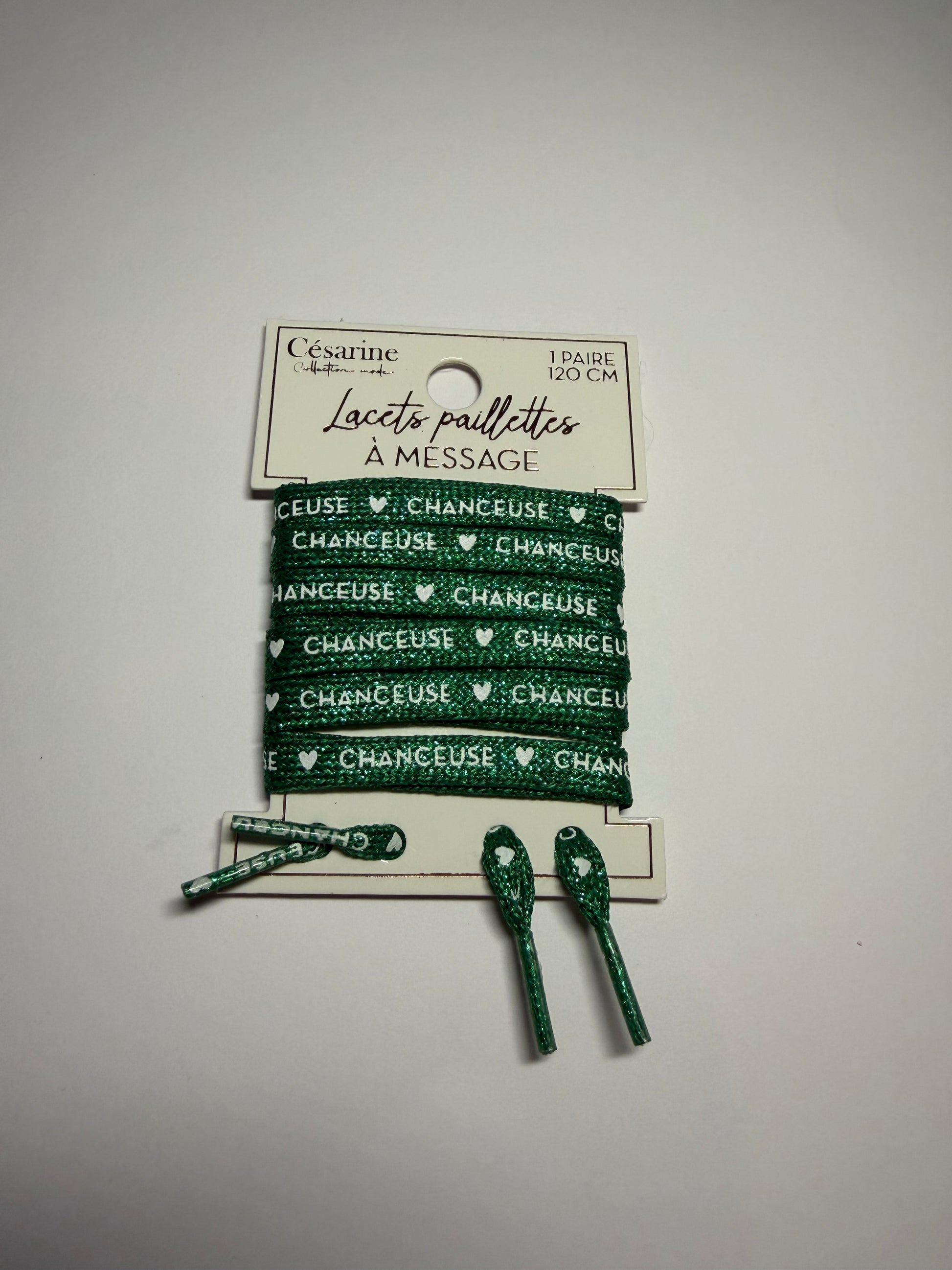 Lacets avec inscriptions pailletées