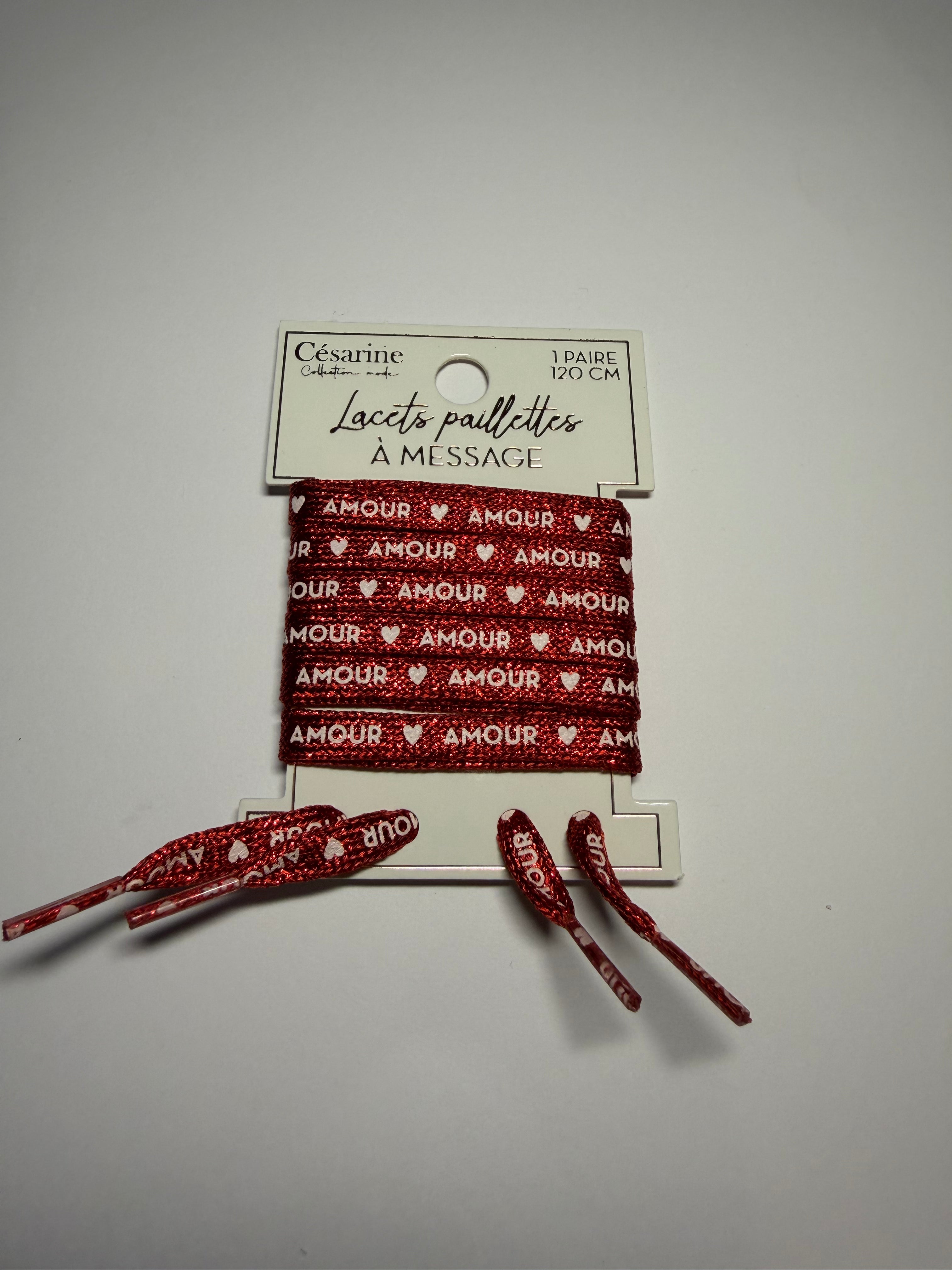 Lacets avec inscriptions pailletées